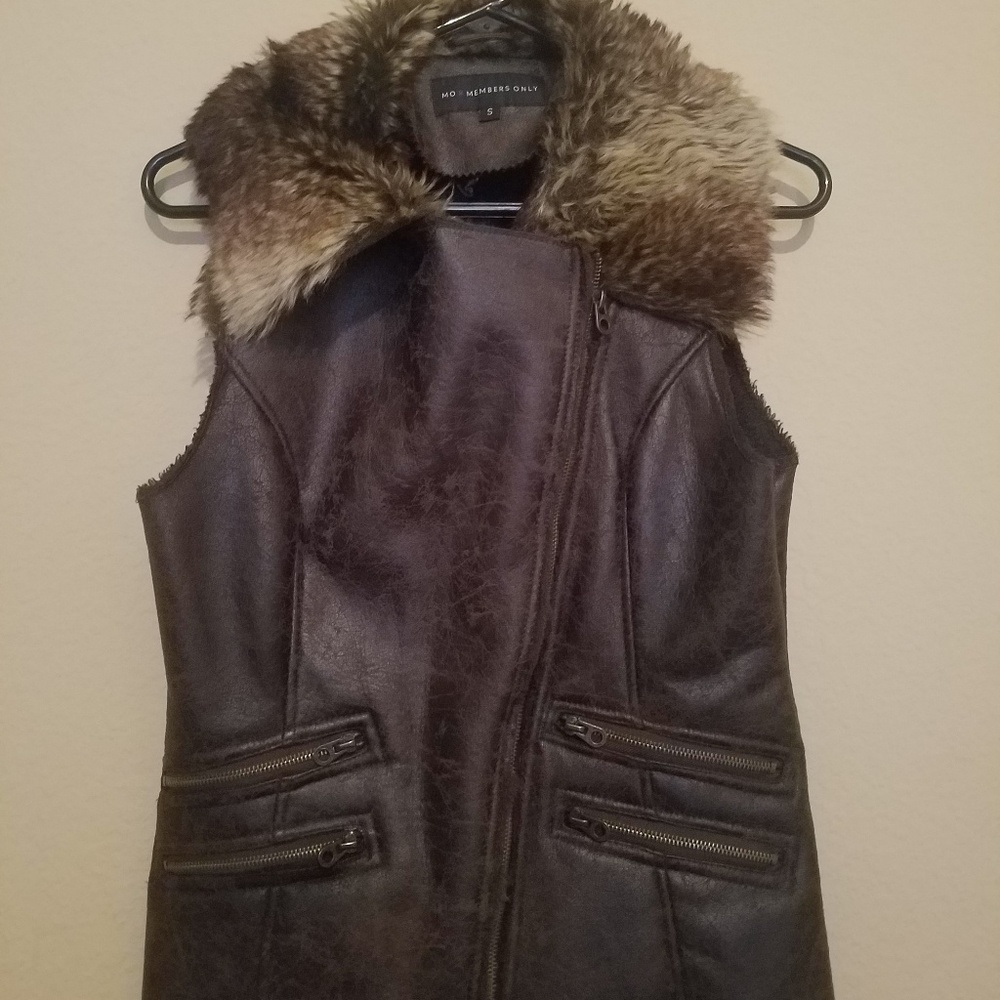 Brown distressed vest size small with faux fur